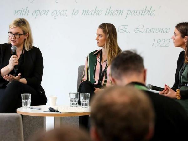 EY staff members and Irish international hockey stars give a talk about their experience