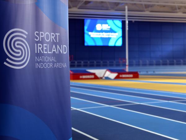 Side angle shot of the running track at the National Indoor Arena