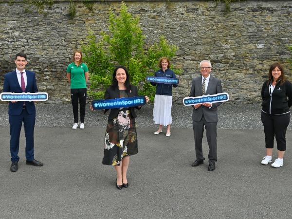 Ministers Chambers and Martin pose for a phot with representative from Sport Ireland