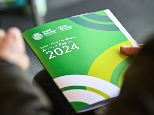 Person holding the Sport Ireland Anti-Doping Annual Report 2024