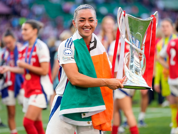 Katie Mc Cabe celebrates with the trophy