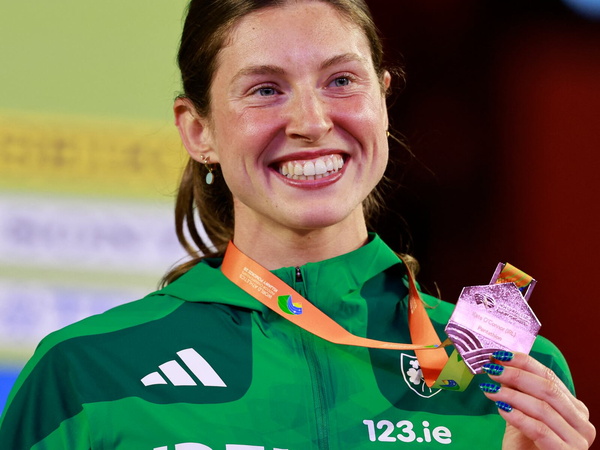 Kate O'Connor holding up her Bronze Medal won at the 2026 World Athletics Indoor Championships