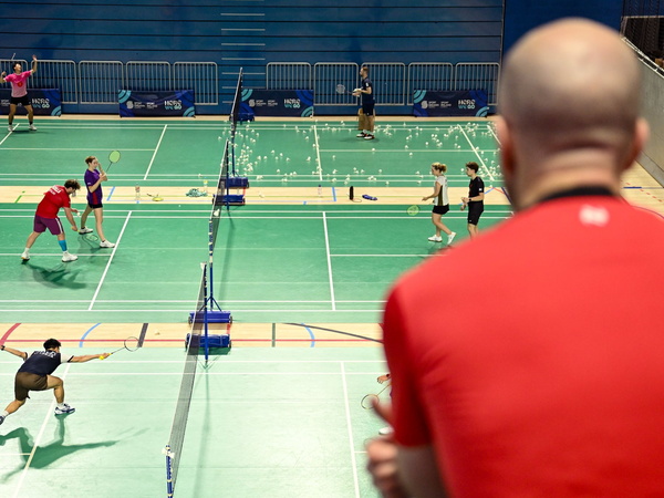 Man watching badminton matches
