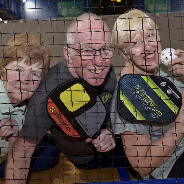 Pickleball players pose for a photo at the Go for Life event