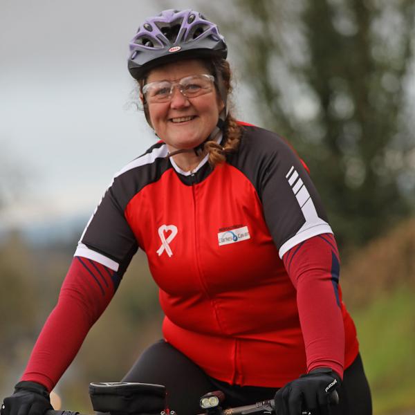 Cyclist Sheiel O'Brien pictured smiling on her bicycle