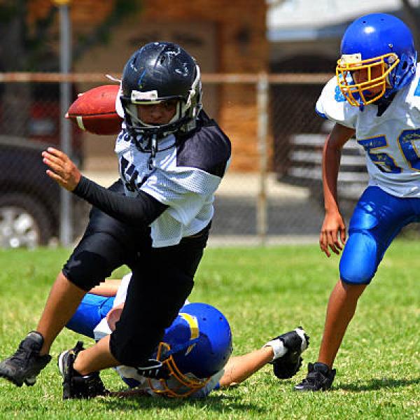 Children playing American Football