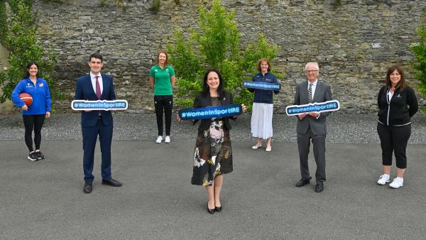 Ministers Chambers and Martin pose for a phot with representative from Sport Ireland