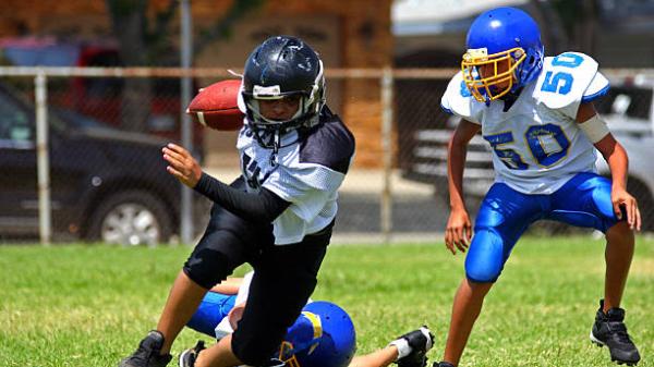 Children playing American Football