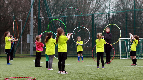 Children playing with Hoola Hoops