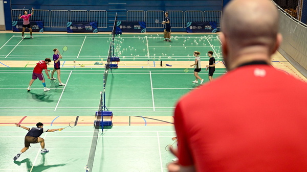 Man watching badminton matches