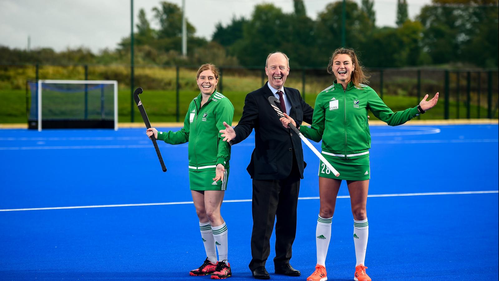 Minister for Transport, Tourism and Sport, Shane Ross TD and Irish International Hockey Players Katie Mullan and Deirdre Duke open the new state of the art hockey pitch at the Sport Ireland Campus 