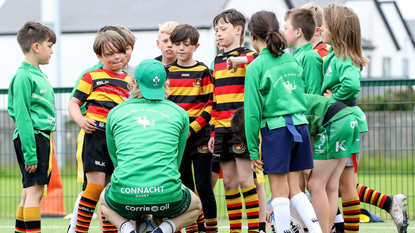 Coach with a group of kids