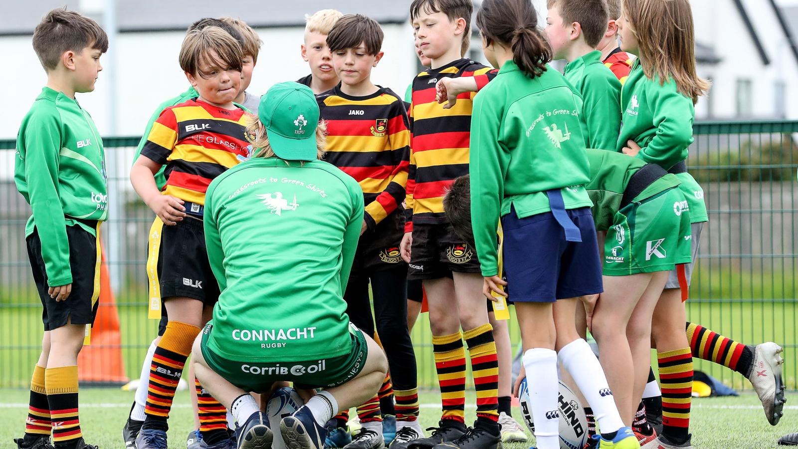 Coach with a group of kids